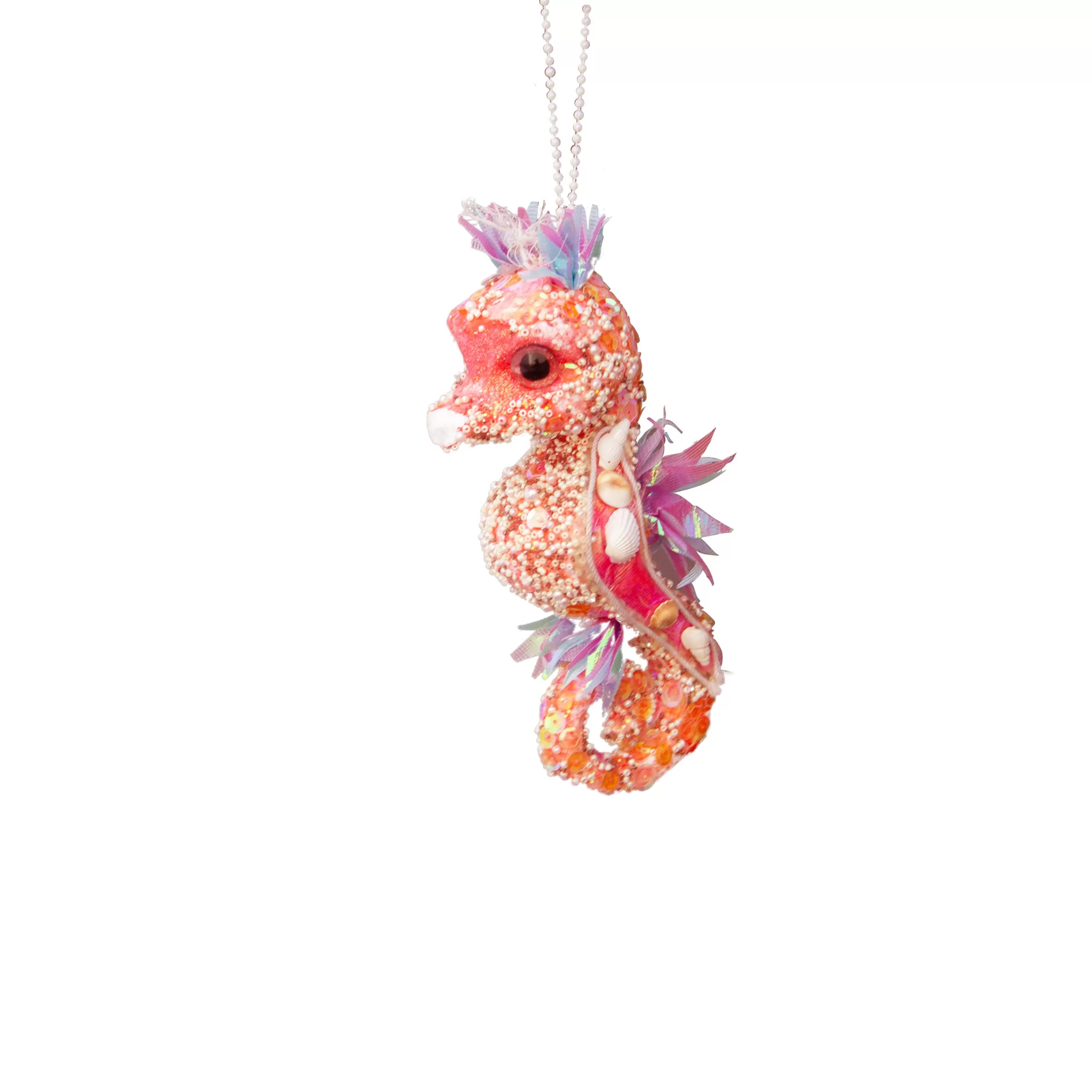 Adorno caballito de mar coral colgate